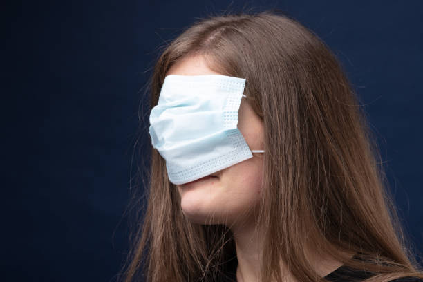 istock wrong ways to wear a surgical mask for covid19 1289884891