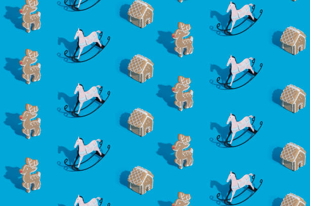istock Christmas pattern made with gingerbread cookies on classic blue background 1289885151