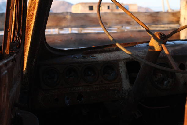 istock Skeleton of Burnt Car Wheel Old Van Rusty Metal 1289886207