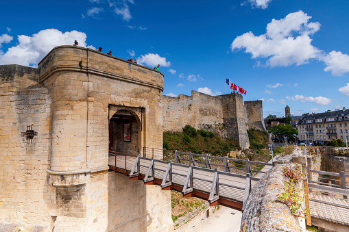 The entrance of the medieval castle Het Steen (The Stone), in Antwerp, Belgium, showing the flags of Antwerp, EU and, Flanders and Belgium