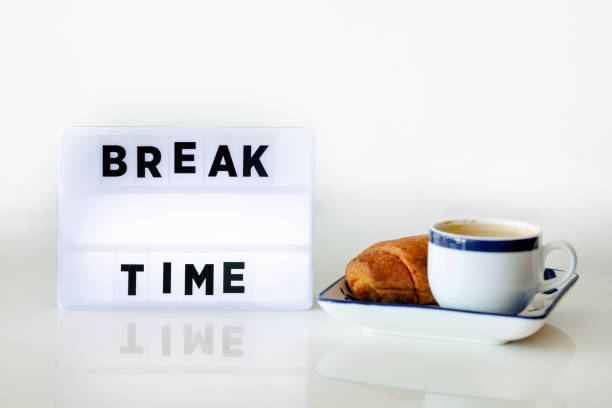istock BREAK TIME concepts with text on light box in home office. 1289886933