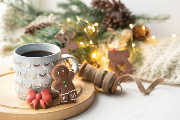 istock Christmas composition with gingerbread boy and beautiful cup with hot drink copy space. 1289887958