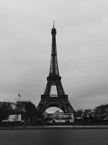 Black and white photo of Paris, France. Aerial view on the Eiffel Tower, Arc de Triomphe, Les Invalides etc.