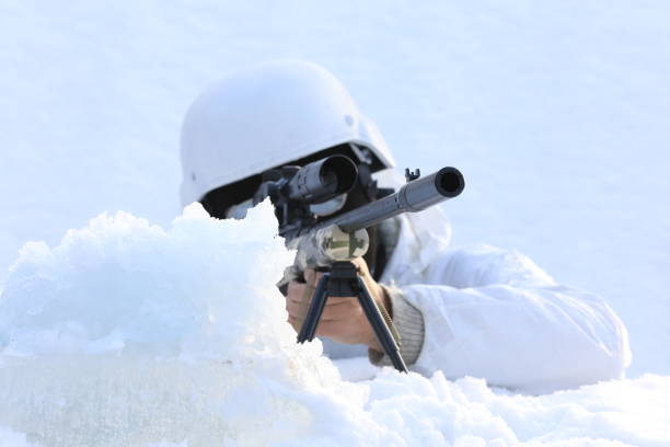sniper with sniper rifle in the snow