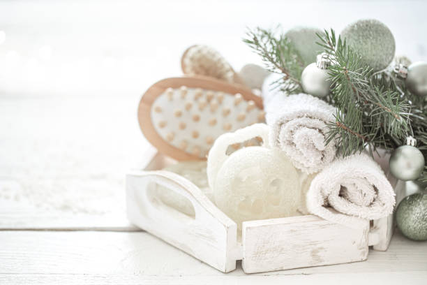 istock Spa composition with Christmas decoration on light blurred background close up. 1289890231