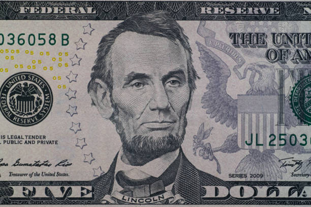 istock Close up detail on American Dollars banknotes 1289898987
