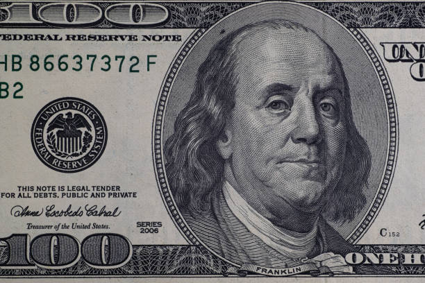 istock Close up detail on American Dollars banknotes 1289898989