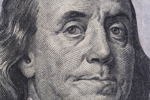 istock Close up detail on American Dollars banknotes 1289898990