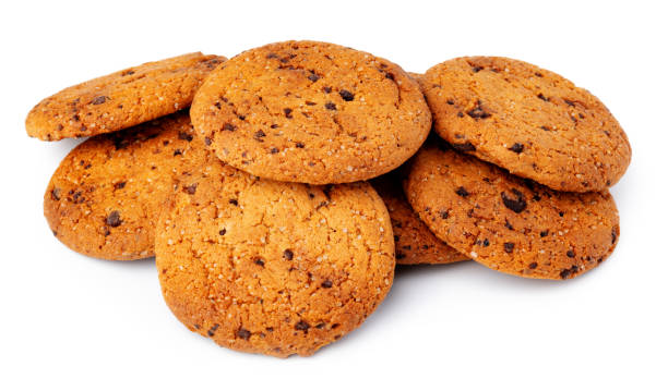 istock Pile of chocolate chip cookies isolated on white background 1289900633