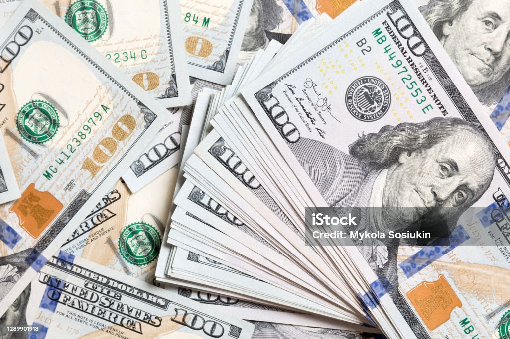 heap of US Dollar bills, money background. Top view of business concept on background with copy space heap of dollars, money background. Top view of business concept on background with copy space. Lottery Stock Photo