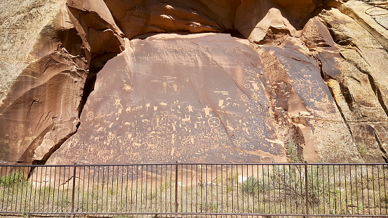 Newspaper Rock State Historic Monument is a Utah state monument featuring a rock panel carved with one of the largest known collections of petroglyphs. It is located in San Juan County, Utah, along Utah State Route 211, 28 miles (45 km) northwest of Monticello and 53 miles (85 km) south of Moab.