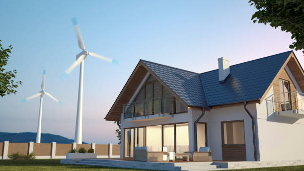 istock House and wind turbines 1289904530