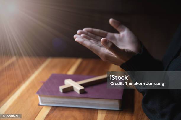 Women Pray To God With The Bible And The Cross With Morning Woman Pray For God Blessing To Wishing Have A Better Life Christian Life Crisis Prayer To God Stock Photo - Download Image Now