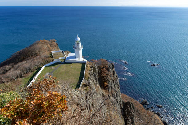 Scenery of Cape Chikyu and the lighthouse in Hokkaido. stock photo
