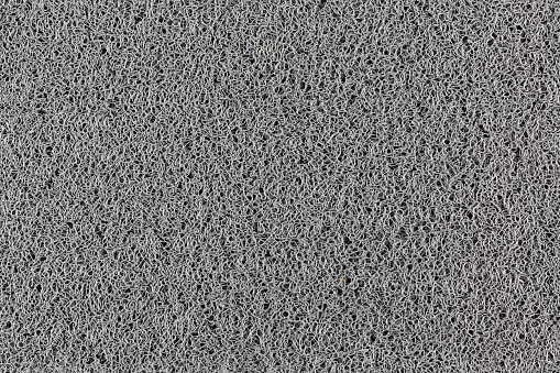 seamless abstract gray texture of rubber hair synthetic carpet.