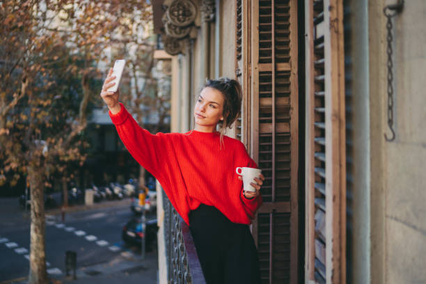 istock Woman taking selfie, COVID-19 pandemic 1289909875