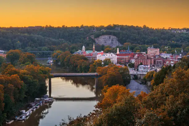 Frankfort, Kentucky, USA town skyline on the Kentucky River at dusk.