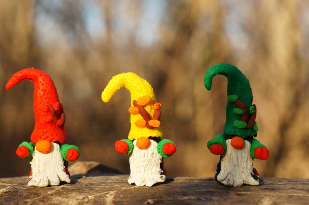 istock Figures of three dwarfs in the forest. 1289914121