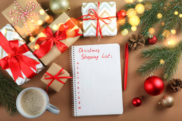istock Beautiful Christmas or New Year background with place for text on colored background top view with golden bokeh. 1289915094
