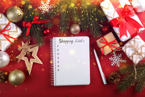 istock Beautiful Christmas or New Year background with place for text on colored background top view with golden bokeh. 1289915177