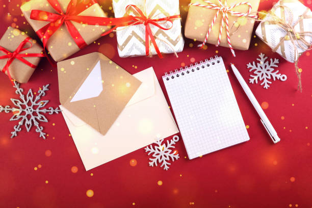istock Beautiful Christmas or New Year background with place for text on colored background top view with golden bokeh. 1289915210