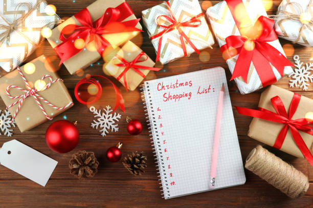 istock Beautiful Christmas or New Year background with place for text on colored background top view with golden bokeh. 1289915211