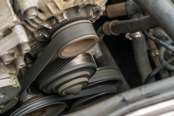 istock AC generator for a car close-up, the engine compartment of a passenger car. 1289915540