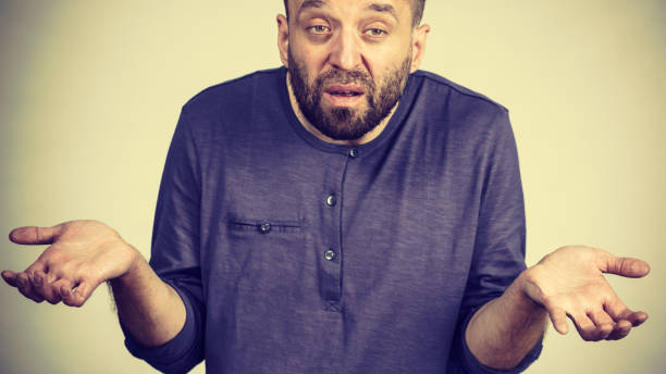 istock Confused adult man seeking for solution 1289916811