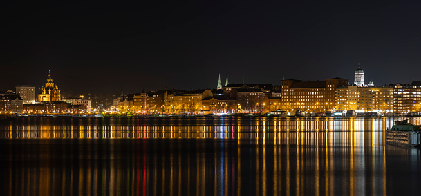 Panorama of Helsinki waterfront with Uspenski and Helsinki Cathedrals in the background.