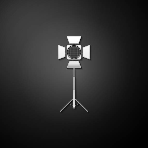 istock Silver Movie spotlight icon isolated on black background. Light Effect. Scene, Studio, Show. Long shadow style. Vector 1289919806