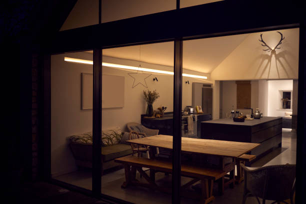 istock Exterior View Of Beautiful Kitchen Extension At Night 1289920680