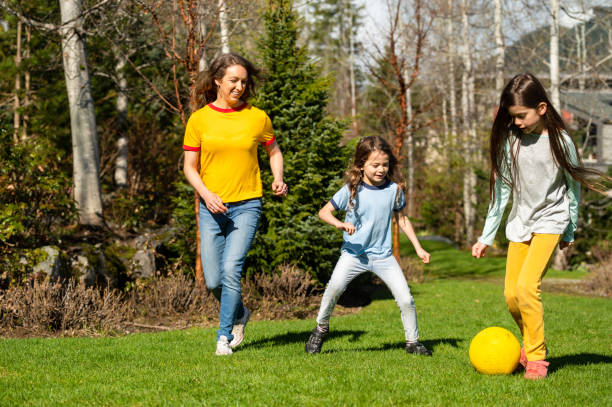 istock Family playing outside in their backyard 1289925458