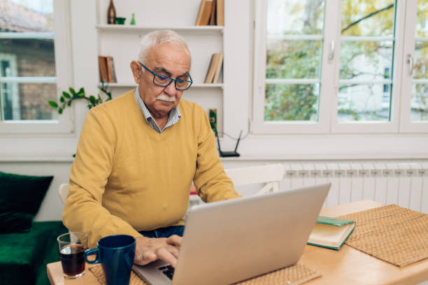 istock Senior entrepreneur working online from home 1289929073