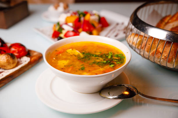 istock Chicken soup with salad and bread. Russian kitchen. 1289931467