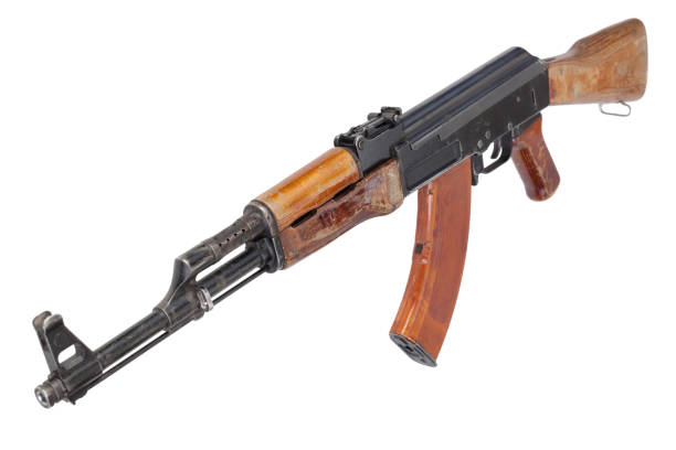 Rare first model AK - 47 assault rifle with a milled receiver Rare first model AK - 47 assault rifle with a milled receiver isolated on white ak 47 violence industry black stock pictures, royalty-free photos & images
