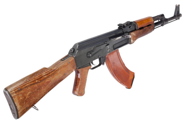 Rare first model AK - 47 assault rifle with a milled receiver Rare first model AK - 47 assault rifle with a milled receiver isolated on white ak 47 violence industry black stock pictures, royalty-free photos & images