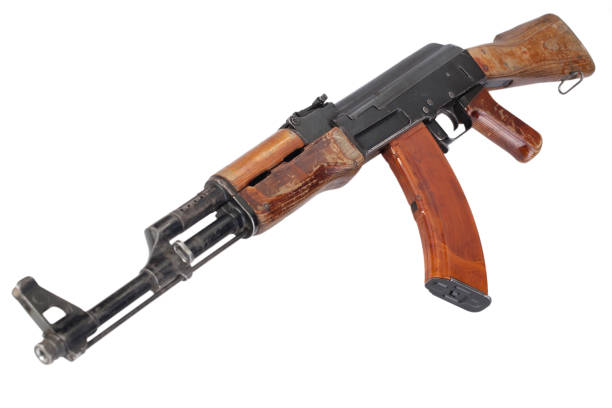 Rare first model AK - 47 assault rifle with a milled receiver Rare first model AK - 47 assault rifle with a milled receiver isolated on white ak 47 violence industry black stock pictures, royalty-free photos & images