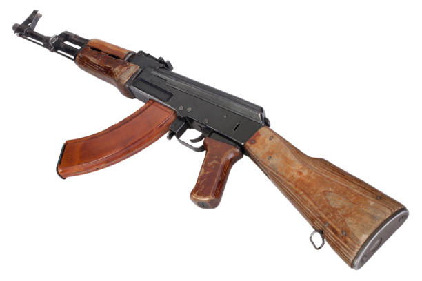 Rare first model AK - 47 assault rifle with a milled receiver Rare first model AK - 47 assault rifle with a milled receiver isolated on white ak 47 violence industry black stock pictures, royalty-free photos & images