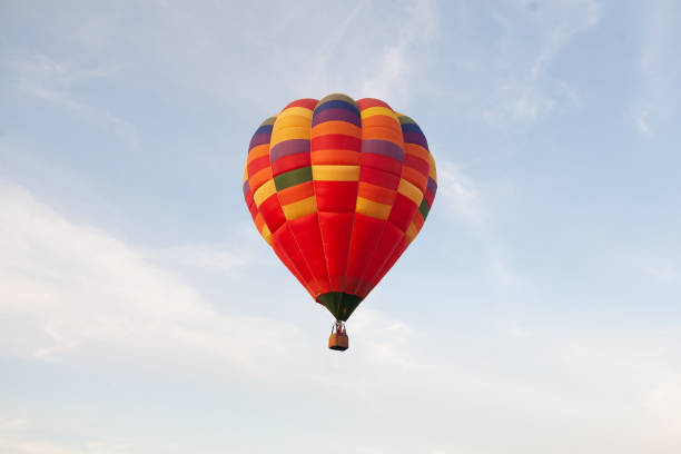 istock Colorful hot air balloon in sky 1289932165