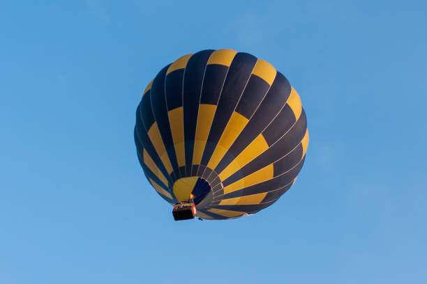 istock Colorful hot air balloon in sky 1289932204