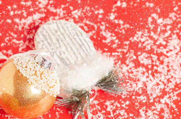 istock Christmas composition. Decorative white mitten on snowflakes background. New year decorations 1289938609
