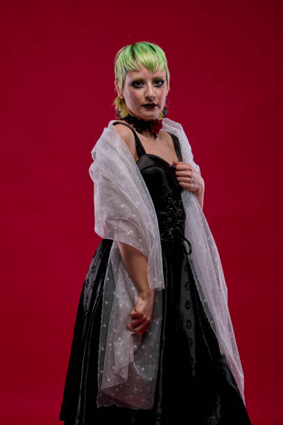 istock Woman dressed in gothic clothes, scary halloween 1289940905