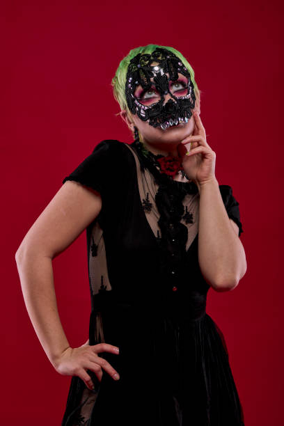 istock Woman dressed in gothic clothes, scary halloween 1289942550