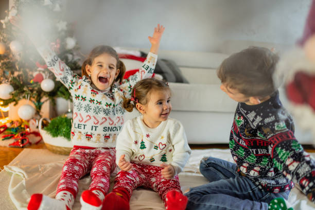 istock Happy children on Christmas Eve 1289942553