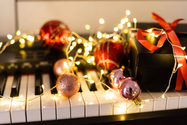 istock Piano keys with Christmas decorations, closeup 1289942804