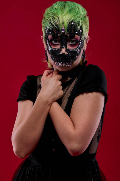 istock Woman dressed in gothic clothes, scary halloween 1289944836