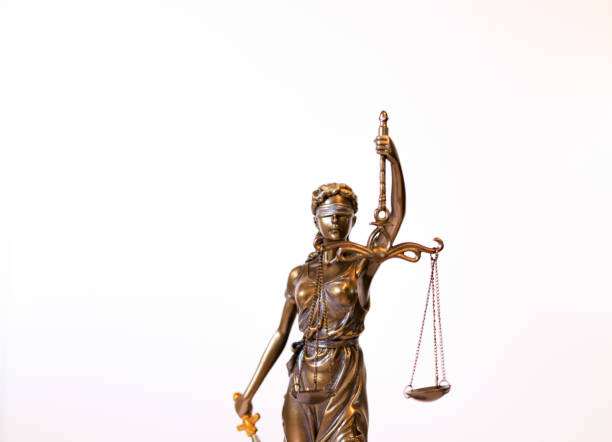 istock Close-up of a justice figure shines from sunlight 1289946909