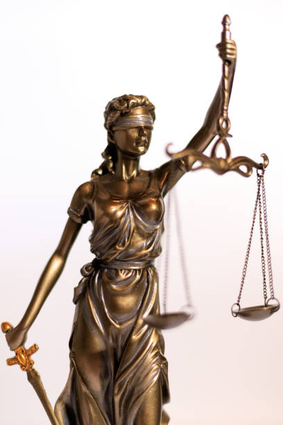 istock Close-up of a justice figure shines from sunlight 1289946911