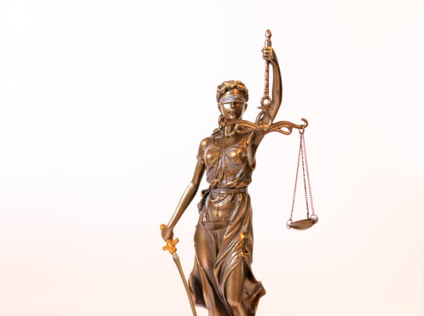 istock Close-up of a justice figure shines from sunlight 1289946938