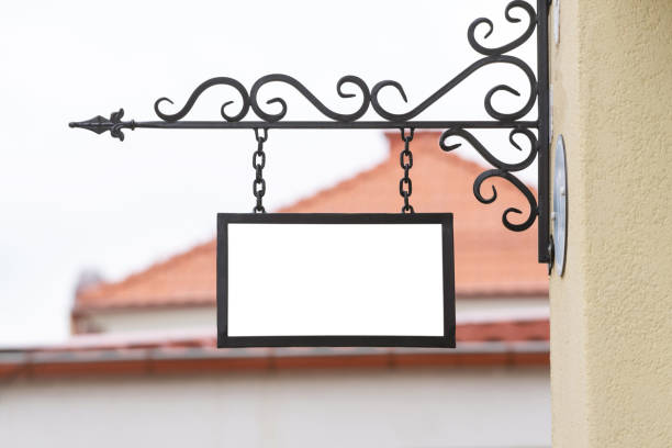 istock White empty signag on the facad of the building 1289947997